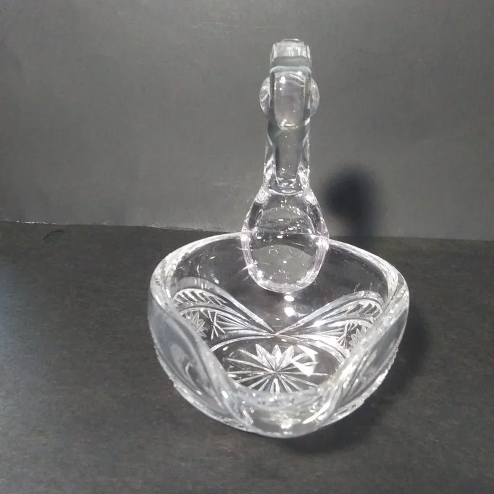 lovely clear glass swan shaped trinket dish with cut design on sides
